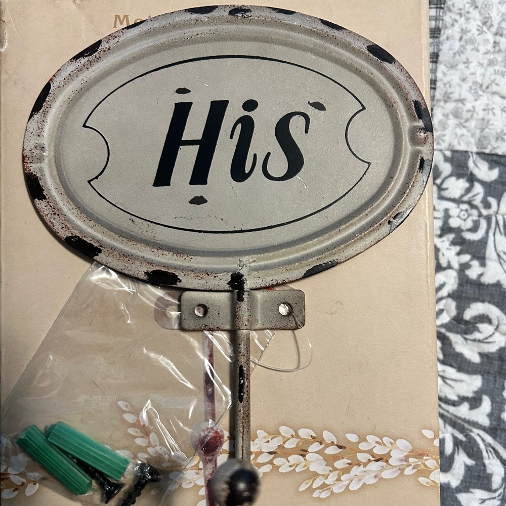 Metal His and Hers hangers/hooks.